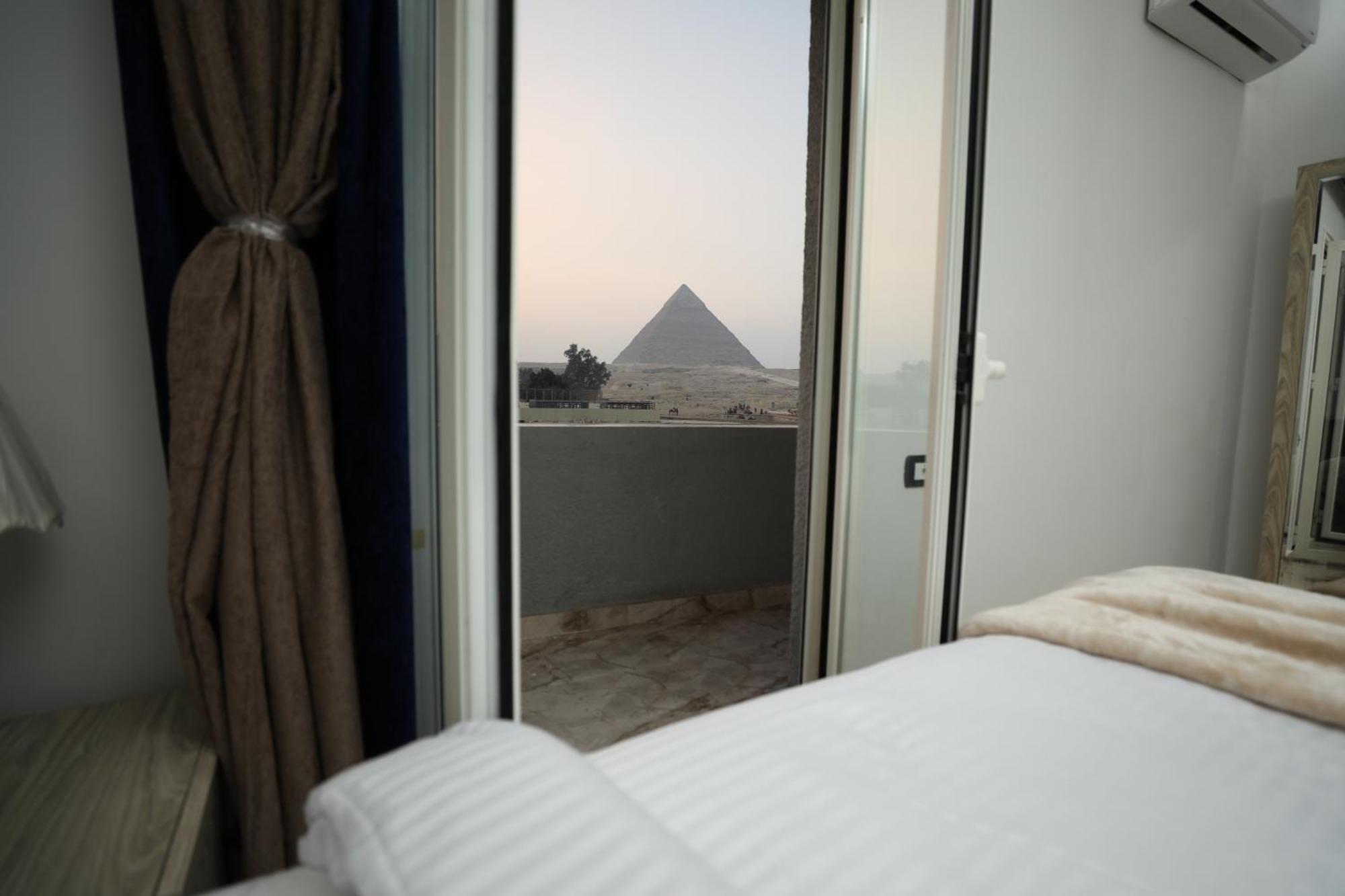 Capital Of Pyramids Hotel Kafrat al Jabal