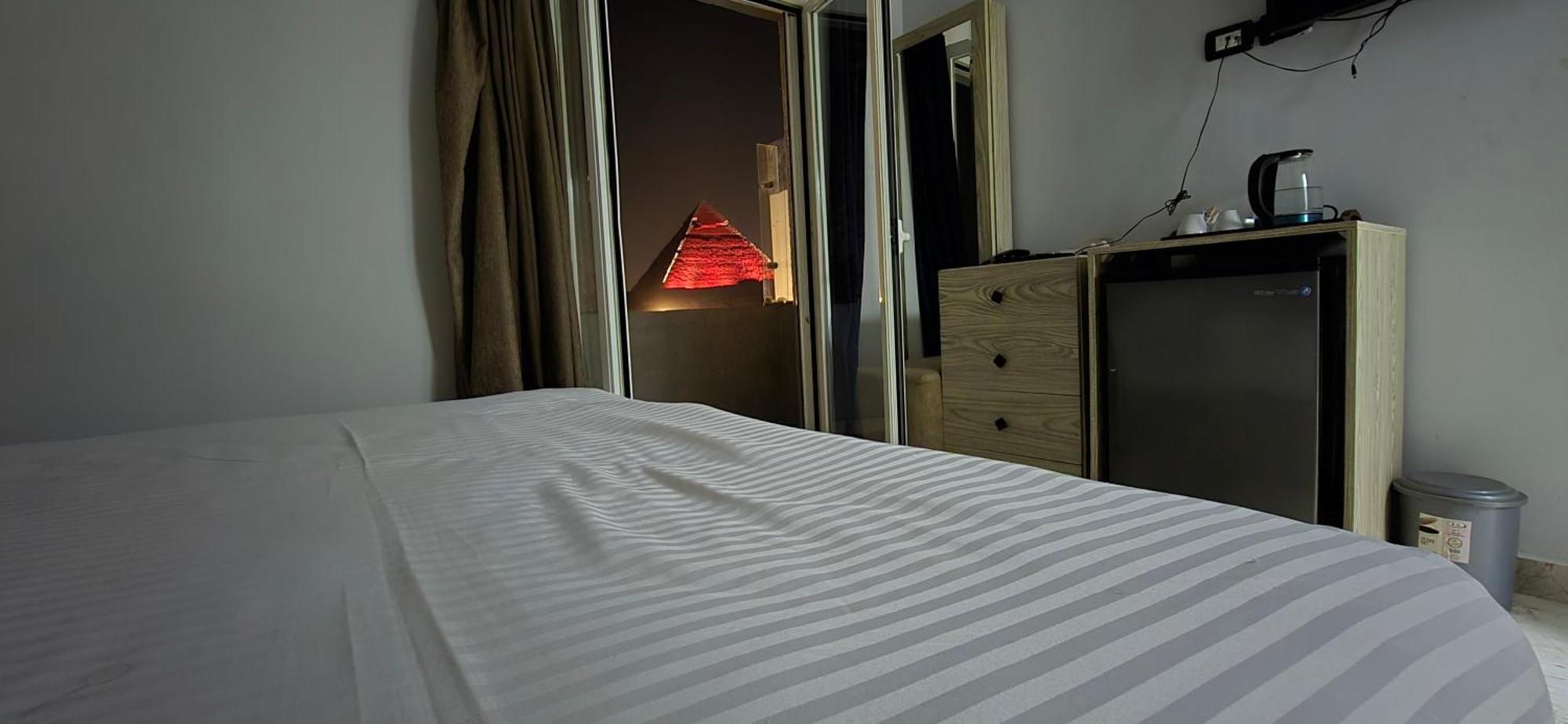 Capital Front Pyramids & Sphinx View فندق Kafret el-Gabal